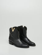 texano "V" oro - Frida SRL