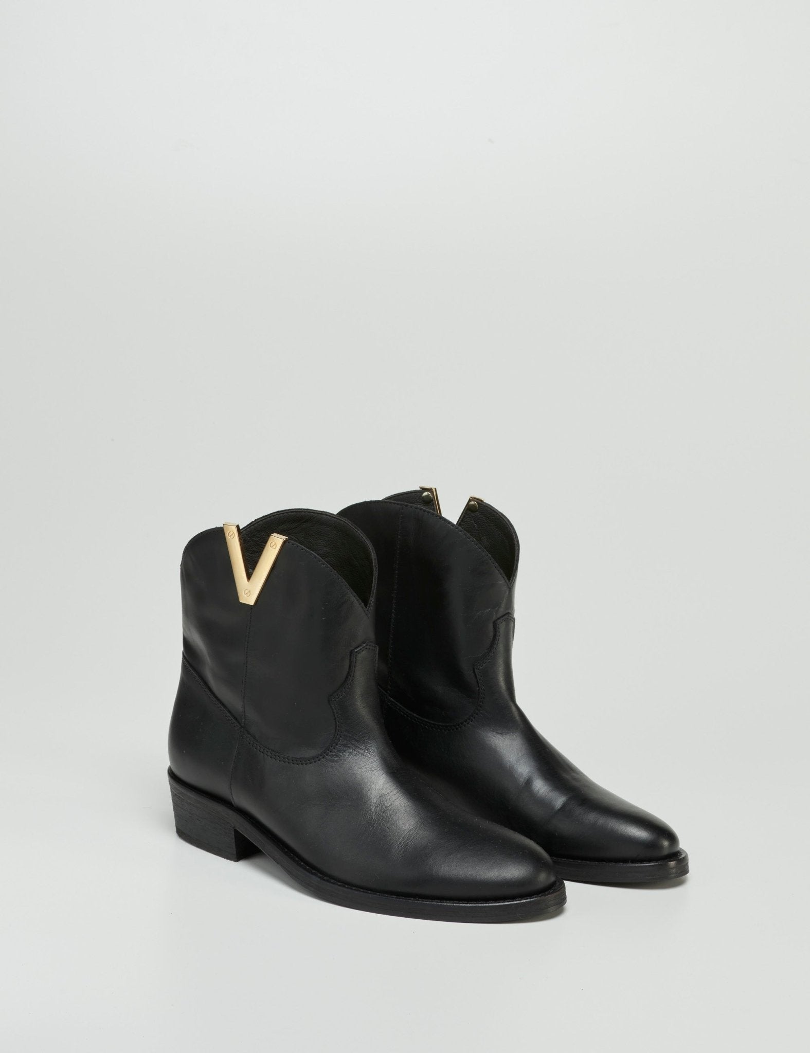 texano "V" oro - Frida SRL